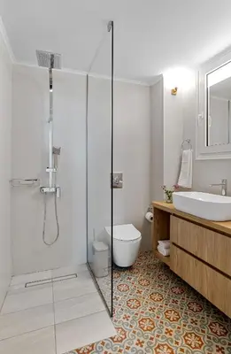 a bathroom with a shower and a toilet and a sink at Villa Remedio in Néon Khoríon
