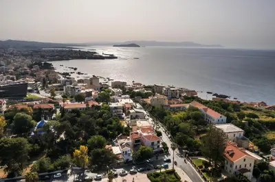 an aerial view of a town next to the water at Belle Epoque Halepa's House & Studio in Chania Town