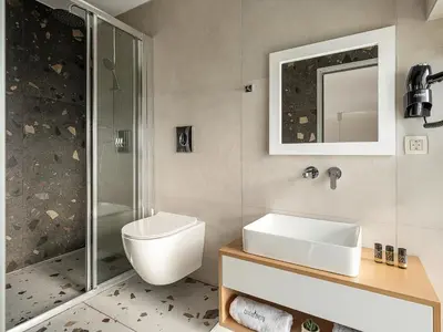 a bathroom with a toilet and a sink and a shower at Cretan Berry Kondylaki in Chania Town