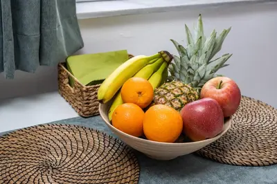 a bowl of fruit with apples oranges and bananas at ''Meraviglia casa'' Christin in Kato Daratso