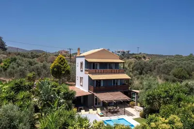 an aerial view of a house with a pool at Villa Liostasi by Villa Plus in Agia Marina Nea Kydonias