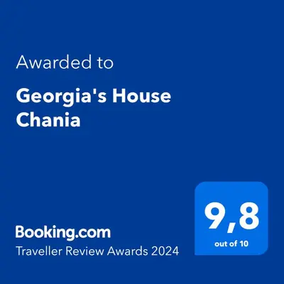 a screenshot of a cell phone with the text awarded to georgias house at Georgia's House Chania in Chania Town
