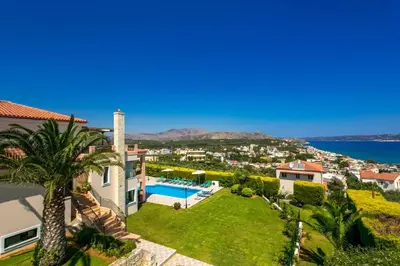 an aerial view of a house with a swimming pool at Villa Margarita Exi by Villa Plus in Kalyves