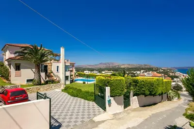a villa with a view of the ocean at Villa Margarita Exi by Villa Plus in Kalyves