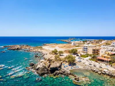 an aerial view of a resort and the ocean at Aris Apartment in Palaiochóra