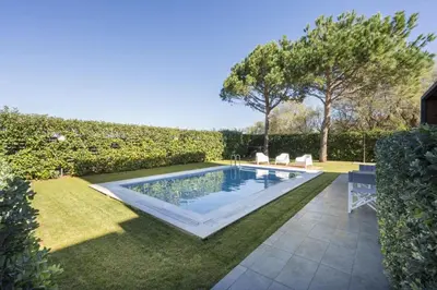 a swimming pool in the yard of a house at Luxury Villas near The Sea With Heated Pool in Kato Daratso