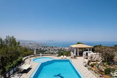 a swimming pool with a view of the city at Villa Paparouna in Chania Town