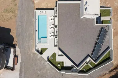 an overhead view of a building with a swimming pool at Kallistefan in Kissamos