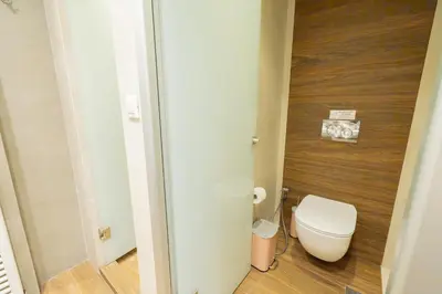 a small bathroom with a toilet in a room at Villy Luxury Home by the Sea 1 in Ayiá