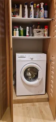 a washer and dryer in a cabinet with at Villy Luxury Home by the Sea 2 in Ayiá