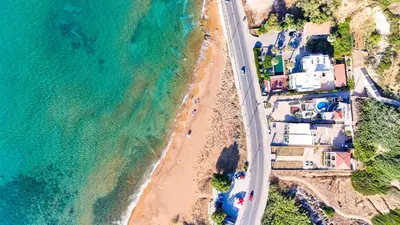 an overhead view of a beach and the ocean at Villy Luxury Home by the Sea 2 in Ayiá