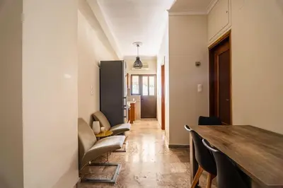 a dining room with a table and chairs at Casa Armonia Seaside by 8essentially in Chania Town
