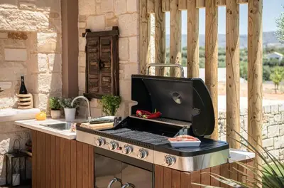 a grill sitting on top of a stove in a kitchen at Villa Peacock with Spa Facilities in Daratso