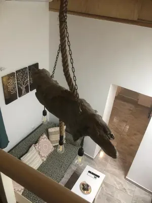 a whale hanging from the ceiling in a living room at Summer mood in Chania Town