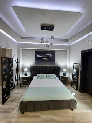 a bedroom with a large bed in a room at Rika’s Luxury seaside apartment in Chania Town