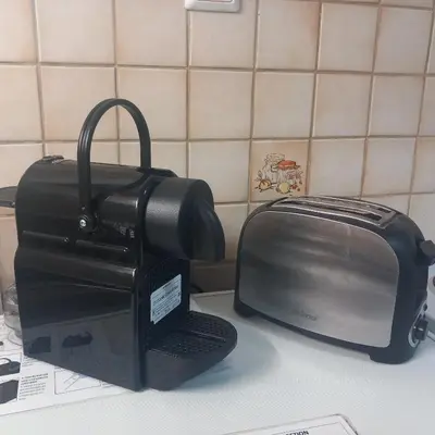 a toaster sitting on a counter next to a toaster at Studio Victory Chania in Chania Town
