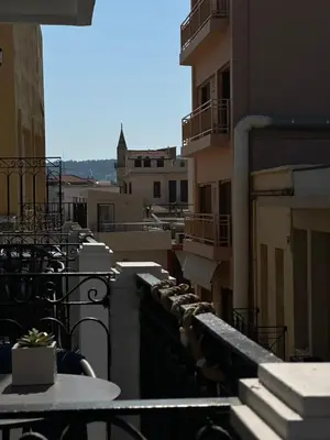 a view of a city from the balcony of a building at Metropolitan Pearl Boutique Hotel in Chania Town