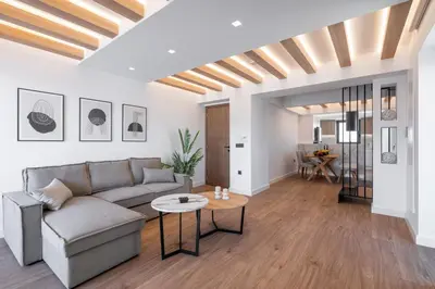 a living room with a couch and a table at Almy Luxury Apartments in Chania Town