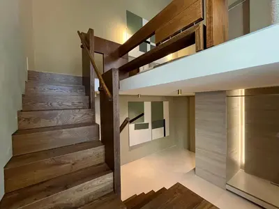 a staircase in a house with wooden floors at Thirty8 Heritage House in Chania Town