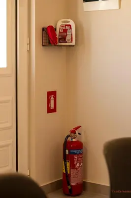 a fire hydrant in the corner of a room at Tabak home Sea side apartment in Chania Town