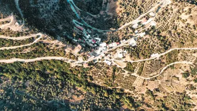an aerial view of a road on a mountain at Lefteris Rooms in Kámbos