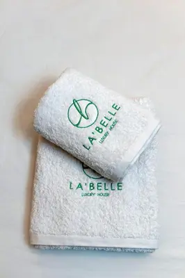 a towel sitting on top of a white towel at La 'belle Luxury House Chania in Chania Town