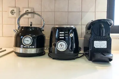 two toaster and a blender on a kitchen counter at Villa Florentina at Chania Suburbs With Private Pool and BBQ in Alikianós