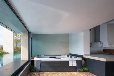 a kitchen with a tub in the middle of a room at Villa Alveo Del Mare in Chania Town