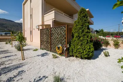 a fire hydrant in front of a house at Peris #1 - Souda in Souda