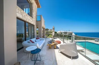 a villa with a view of the ocean at Villa Poseidon One - Sunset & Sea Front Villa in Chorafakia