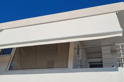 a window on the side of a building at MAGIC VIEW APARTMENT in Chania Town