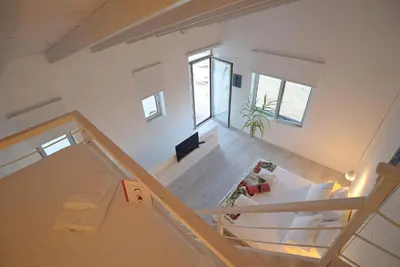 an overhead view of a staircase in a house at Annassa Experience Suites 2' walk from Almyrida Beach in Almirida