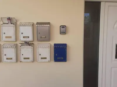 a group of electrical boxes on a wall at NEFELI APARTMENT CHANIA in Chania Town