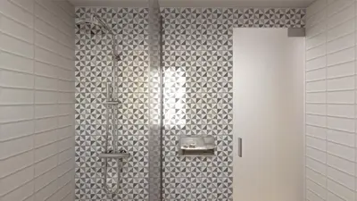 a shower in a bathroom with white tiles at Elafonisi Resort by Kalomirakis Family in Elafonisi