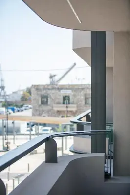 a view of a building from a balcony at Souda Plaza Collection in Souda