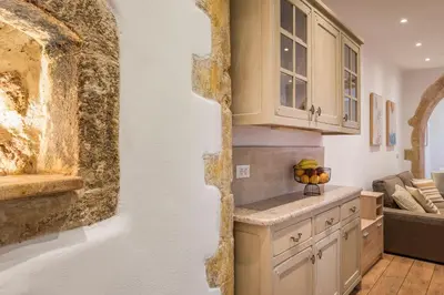 a kitchen with a sink and a counter top at Pasifai Residence - Chania old town in Chania Town