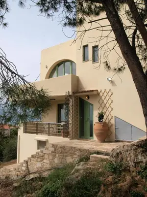 a house on the hill with a tree at The Garden of Zephyrus - East in Pithárion