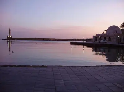 a view of a body of water with a building at Chania-Limani Splantzia-geada in Chania Town