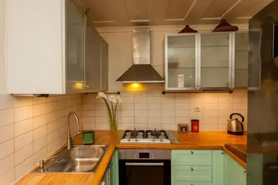 a kitchen with a sink and a stove at History & Culture in Old Town Chania in Chania Town