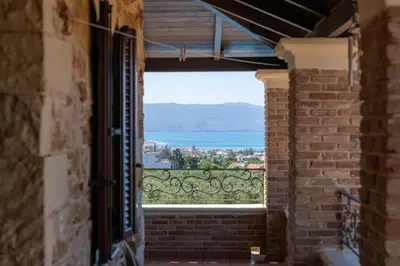 an open window with a view of the water at Giovanta Villa in Kondomari