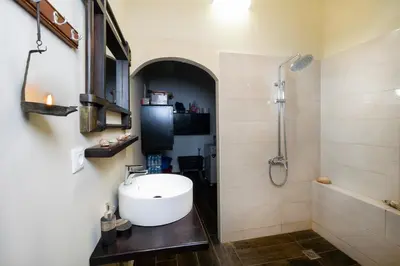 a bathroom with a sink and a shower at Villa Leon in Souda