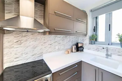 a kitchen with a sink and a counter top at Sunshine Suite Junior in Chania Town