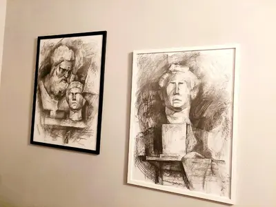 two drawings of apes hanging on a wall at Art and view-studio in Kounoupidhianá