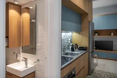 a small kitchen with a sink and a sink at West City Suite in Chania Town