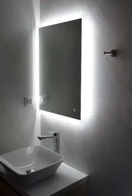 a white bathroom with a sink and a mirror at Cozy Val in Chania Town