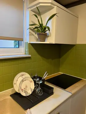 a kitchen with a sink and a plate on a counter at m&m's city loft in Chania Town