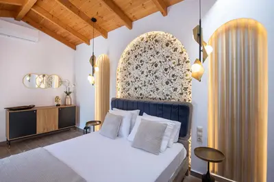 a bedroom with a bed with a moroccan headboard at Nicole Villa I 