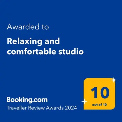 a yellow sign with the text awarded to relaxing and comfortable studio at Relaxing and Comfortable Studio Near Falasarna Beaches in Plátanos