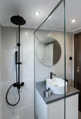 a bathroom with a sink and a mirror at Home Sweet Home - Big Balcony with Great View in Kissamos