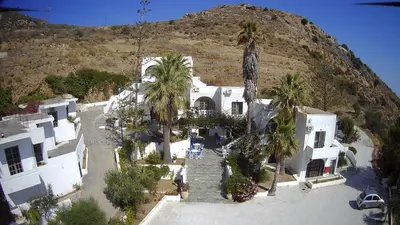 an aerial view of a house with palm trees at Delfini Apartments in Kissamos